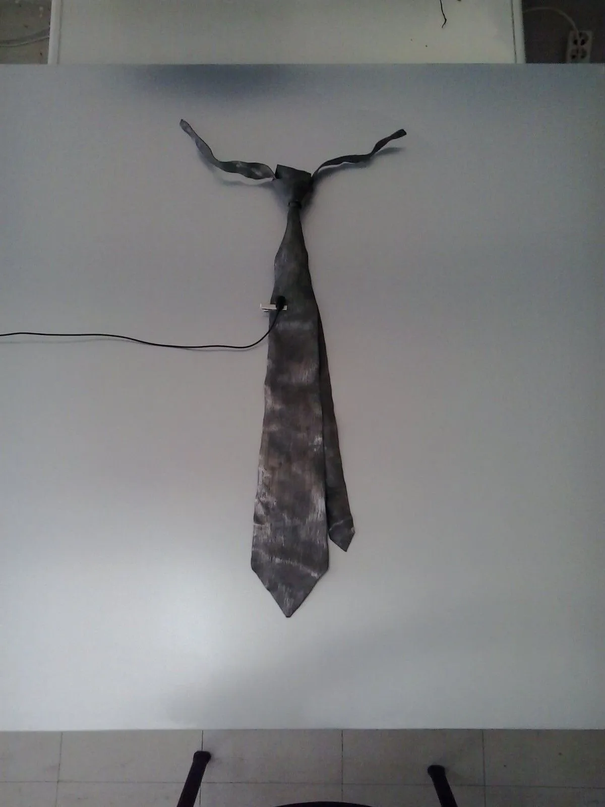 Too light to hear, heavy to wear, artwork by Dimitrios Adamopoulos