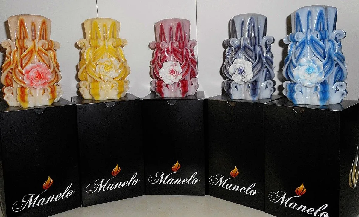 Rose carved candles, artwork by Maris Kalksteins