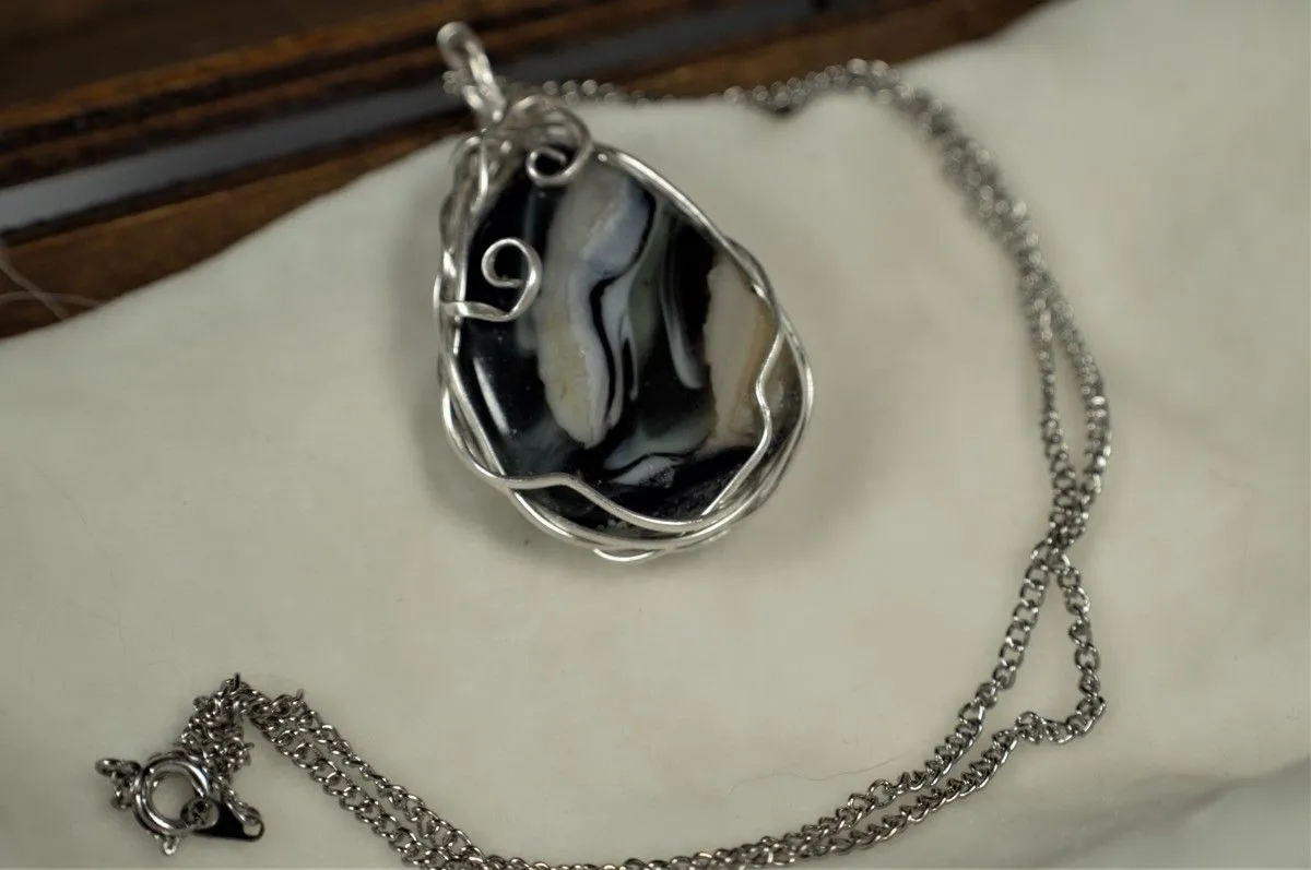 Silver Pendant, artwork by Katie McLeod