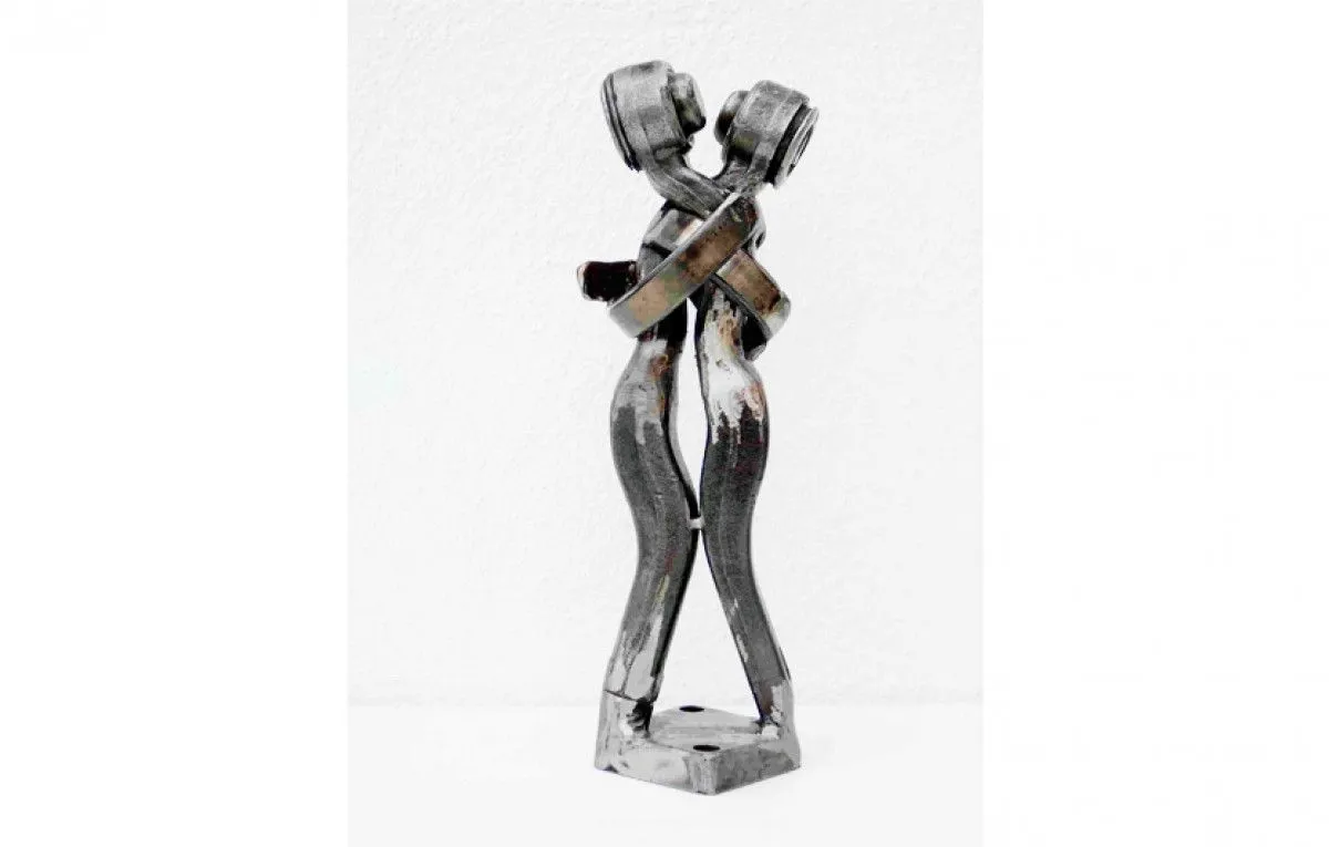 Lovers hug artwork sculpture, artwork by Dendrinos gIANNIS