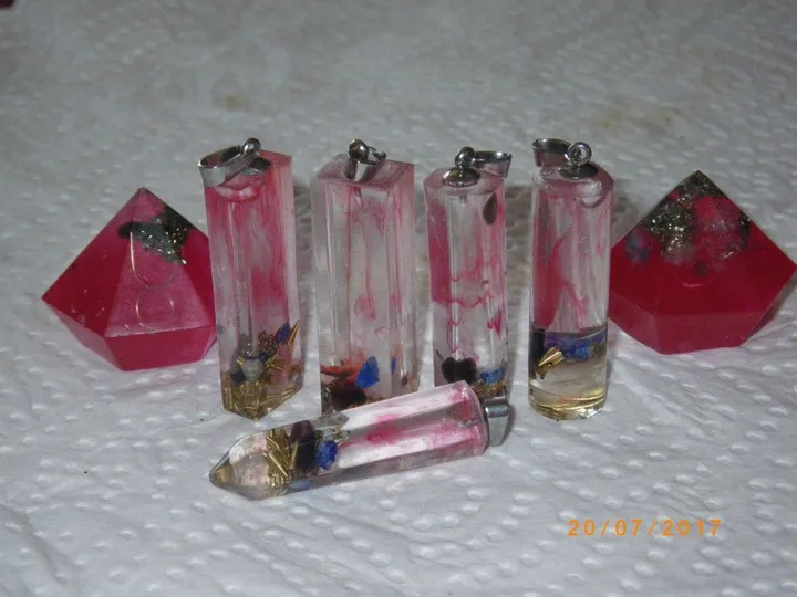 pendants (orgonite), artwork by Richard webb