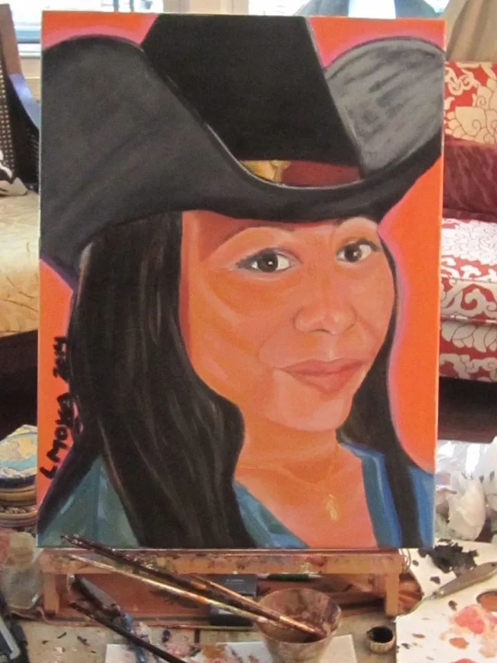 Portrait of woman with hat, artwork by Ligia Moya