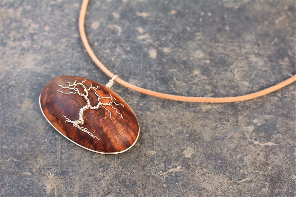 Sterling silver tree on a Holm Oak wood pendant, artwork by Arnold van