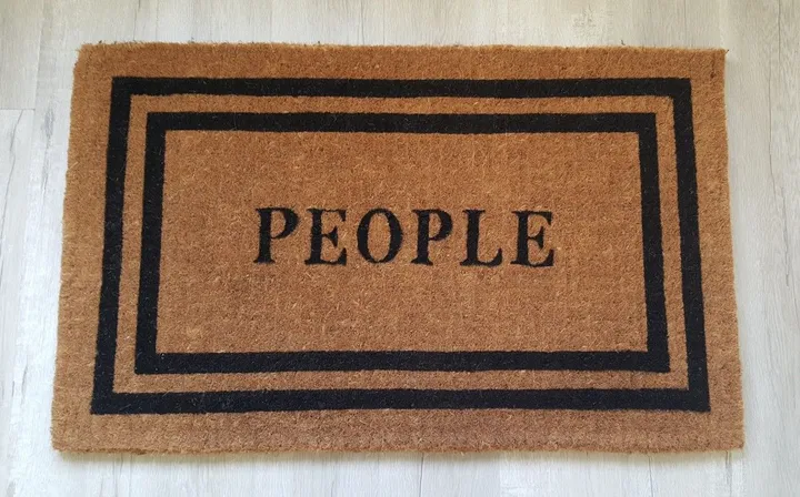 PEOPLE / Doormat of the power., artwork by Klaus Guingand